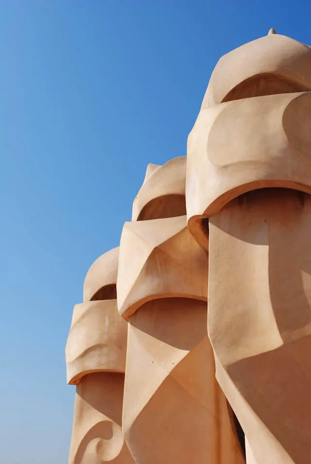 Some stature on the roof of a house in Barcelona