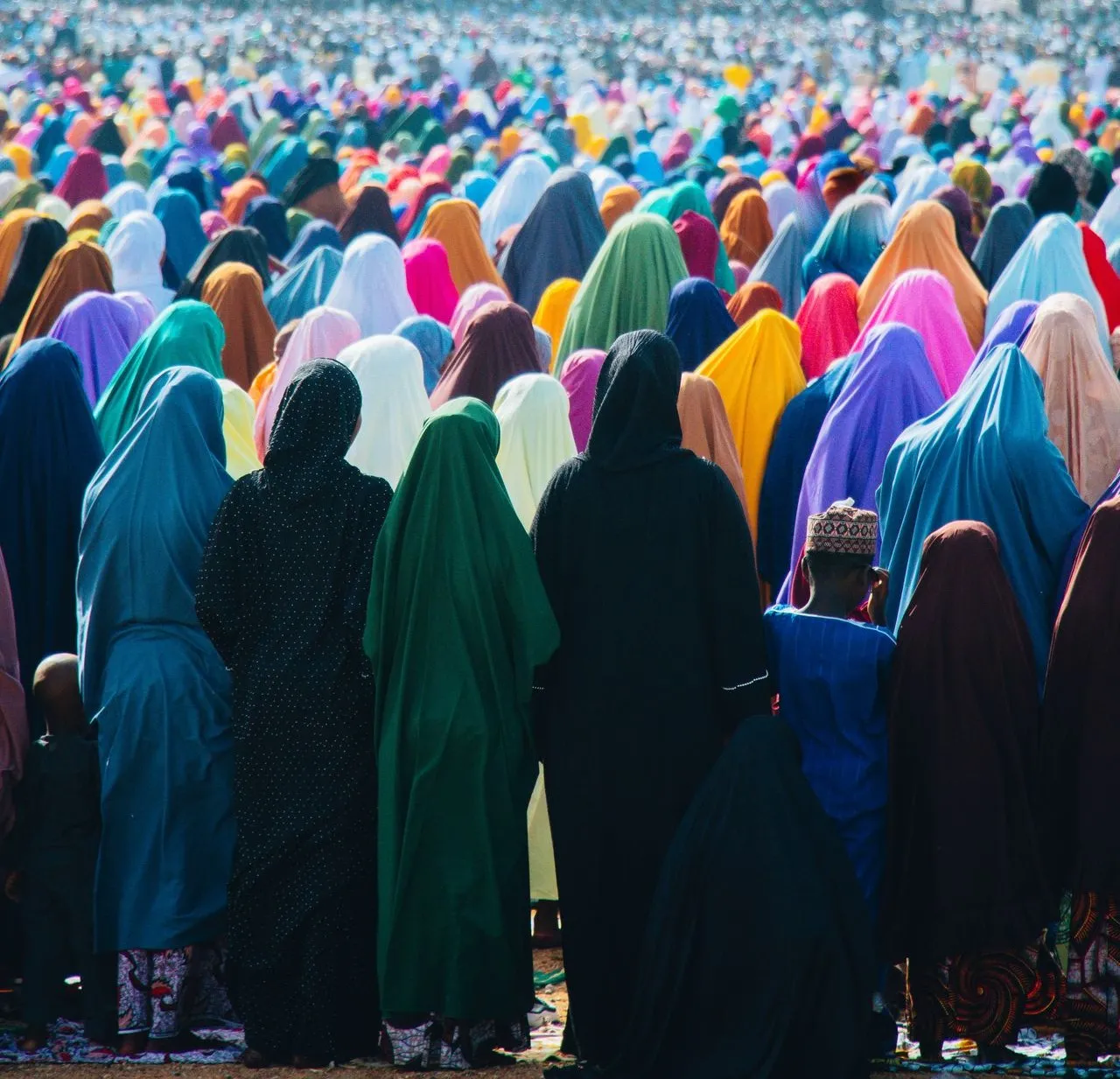 Some woman in Hijiab praying