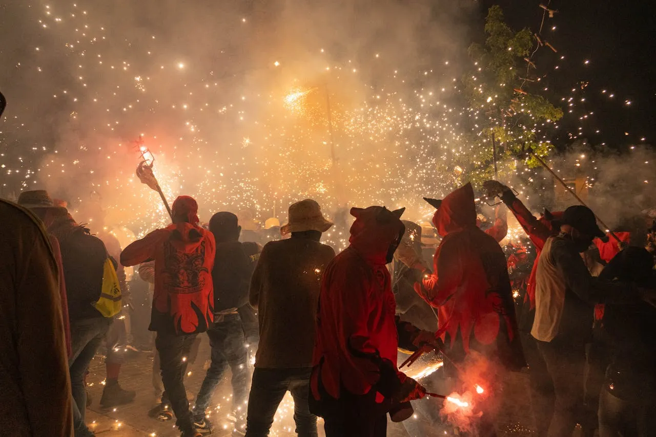 People playing with firecrakers on the streets of Barcelona